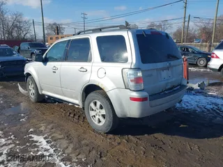 2010 Mercury Mariner with VIN 4M2CN8B72AKJ30465, listed as a IAAI auction lot 41554592 with 110,973 mi miles. Bid and sale history available at carsss.com. Image 3.