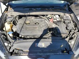 2014 Ford Fusion Titanium с VIN 3FA6P0K99ER282184, выставлен на аукционе Copart как лот 55485705 с пробегом 170 551 миль миль и Списание • Salvage title. История ставок и продаж доступна на DreamBid. Изображение 11.