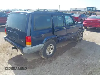2001 Jeep Cherokee Sport with VIN 1J4FT48S01L522281, listed as a IAAI auction lot 41999570 with 261,698 mi miles and . Bid and sale history available at DreamBid. Image 4.