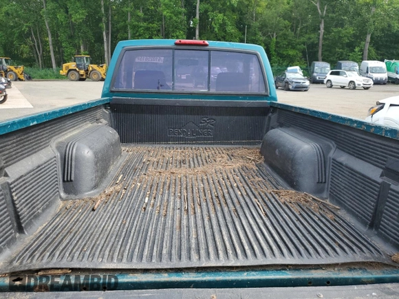1997 Nissan Frontier XE with VIN 1N6SD11Y4VC346711, listed as a Copart auction lot 61025615 with 100,417 mi miles and Clean title. Bid and sale history available at DreamBid. Image 10.
