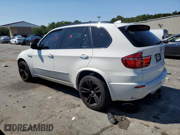 2011 BMW X5 M with VIN 5YMGY0C57BLK26432, listed as a Copart auction lot 67023344 with 74,800 mi miles and Salvage Title. Bid and sale history available at carsss.com. Image 2.
