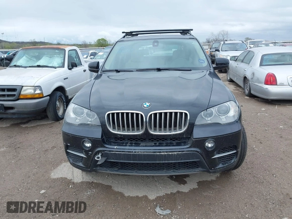 2012 BMW X5 35d z VIN 5UXZW0C55CL674191, wystawiony jako IAAI lot #41906713 z przebiegiem 143 687 mil mil oraz . Historia ofert i sprzedaży dostępna na DreamBid. Obrazek 13.