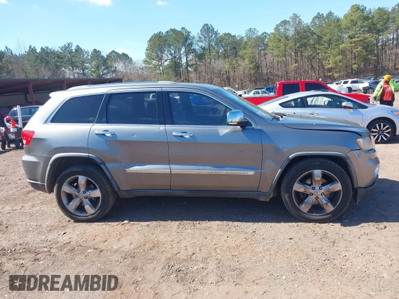 2012 Jeep Grand Cherokee Overland with VIN 1C4RJECT7CC105614, listed as a IAAI auction lot 41629174 with 264,756 mi miles. Bid and sale history available at carsss.com. Image 13.