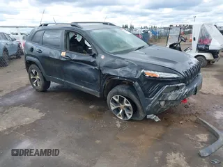 2014 Jeep Cherokee Trailhawk with VIN 1C4PJMBS5EW128658, listed as a IAAI auction lot 41722320 with 1 mi miles. Bid and sale history available at carsss.com. Image 1.