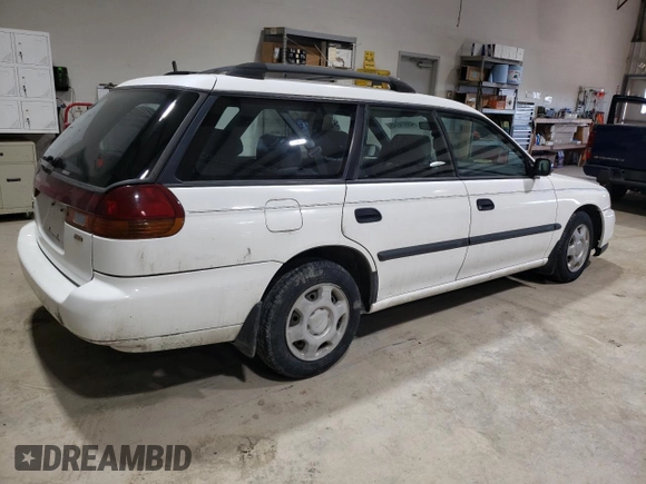 1998 Subaru Legacy L with VIN 4S3BK4352W7315173, listed as a Copart auction lot 45974945 with 87,909 mi miles and Salvage title. Bid and sale history available at DreamBid. Image 3.