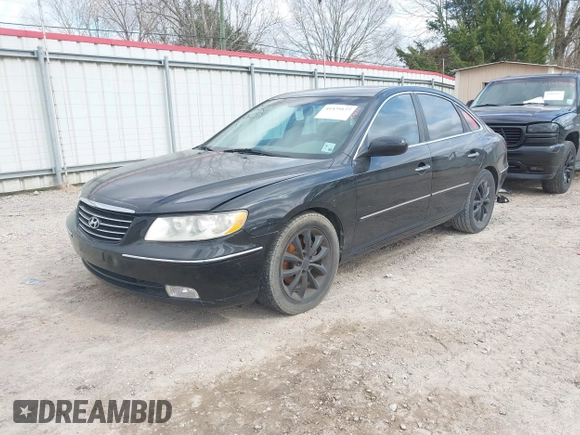 2006 Hyundai Azera SE with VIN KMHFC46F16A087393, listed as a IAAI auction lot 41475177 with 124,197 mi miles and . Bid and sale history available at DreamBid. Image 2.