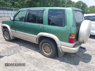 1998 Isuzu Trooper S z VIN JACDJ58X0W7908301, wystawiony jako IAAI lot #42274490 z przebiegiem 267 053 mil mil oraz . Historia ofert i sprzedaży dostępna na DreamBid. Obrazek 3.