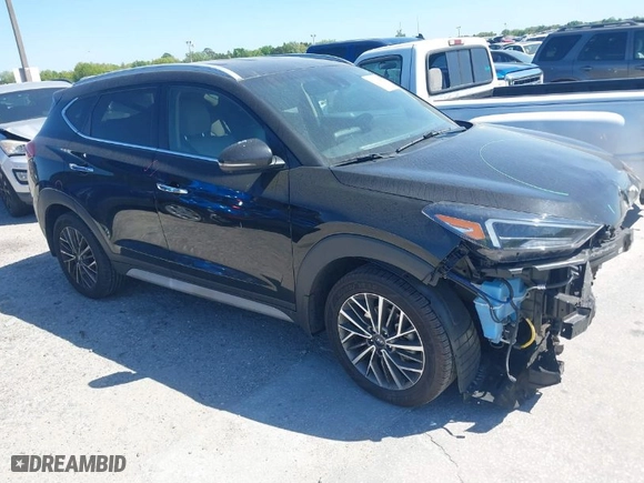 2021 Hyundai Tucson Limited with VIN KM8J33AL9MU305948, listed as a IAAI auction lot 41834956 with 100,098 mi miles. Bid and sale history available at carsss.com. Image 1.