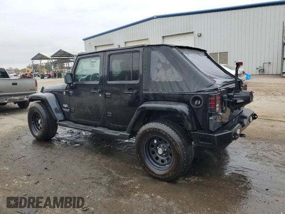 2008 Jeep Wrangler Unlimited Sahara with VIN 1J4GA59148L574934, listed as a Copart auction lot 74590164 with 134,674 mi miles and Salvage title. Bid and sale history available at DreamBid. Image 2.