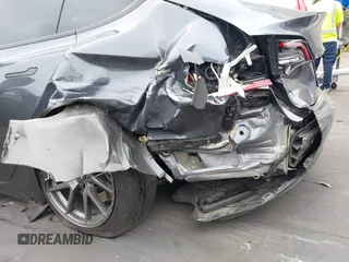 2023 Tesla Model 3 z VIN 5YJ3E1EAXPF403095, wystawiony jako IAAI lot #42151764 z przebiegiem 17 872 mil mil oraz . Historia ofert i sprzedaży dostępna na DreamBid. Obrazek 11.