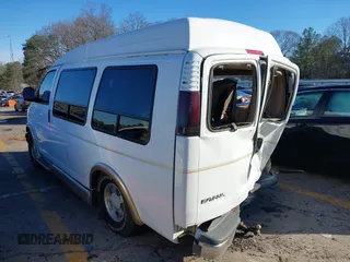 1998 GMC Savana Cargo Van YF7 with VIN 1GDFG15R5W1014364, listed as a IAAI auction lot 41578281 with 168,915 mi miles. Bid and sale history available at carsss.com. Image 3.