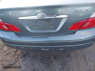 2003 Toyota Avalon XL with VIN 4T1BF28BX3U277269, listed as a IAAI auction lot 41589582 with 129,895 mi miles. Bid and sale history available at carsss.com. Image 12.