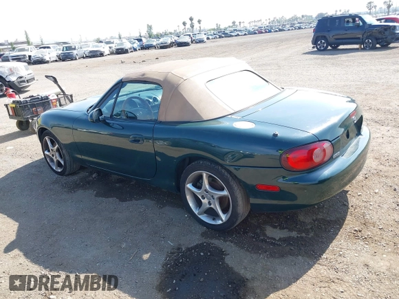 2001 Mazda MX-5 Miata z VIN JM1NB353110214307, wystawiony jako IAAI lot #42407414 z przebiegiem 158 400 mil mil oraz . Historia ofert i sprzedaży dostępna na DreamBid. Obrazek 3.