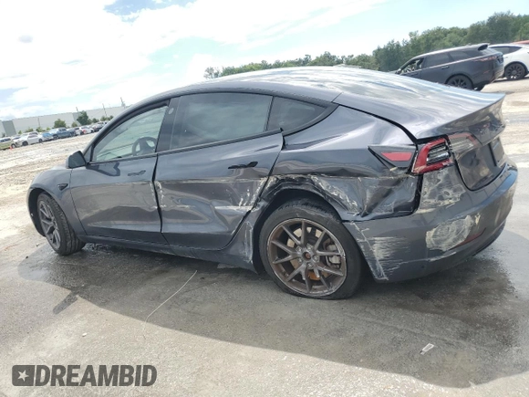 2023 Tesla Model 3 с VIN 5YJ3E1EA7PF449077, выставлен на аукционе Copart как лот 56821975 с пробегом 42 037 миль миль и Списание • Salvage title. История ставок и продаж доступна на DreamBid. Изображение 2.