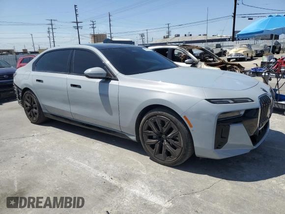 2023 BMW 7 Series 740i with VIN WBA23EH05PCM61539, listed as a Copart auction lot 58013225 with 16,242 mi miles and Salvage title. Bid and sale history available at DreamBid. Image 4.