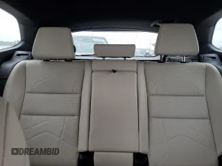 2024 BMW X1 xDrive28i z VIN WBX73EF07R5Y34795, wystawiony jako Copart lot #52121345 z przebiegiem 8 605 mil mil oraz Nie do naprawy • Non repairable. Historia ofert i sprzedaży dostępna na DreamBid. Obrazek 10.