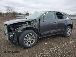 2019 Cadillac XT5 Luxury AWD with VIN 1GYKNDRS3KZ105548, listed as a Copart auction lot 49444225 with 86,909 mi miles and Salvage Title. Bid and sale history available at carsss.com. Image 1.