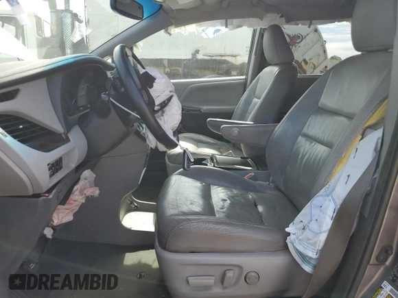 2015 Toyota Sienna XLE with VIN 5TDYK3DC5FS643985, listed as a Copart auction lot 56956505 with 179,131 mi miles and Salvage title. Bid and sale history available at DreamBid. Image 7.