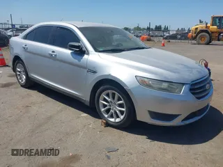2013 Ford Taurus SE z VIN 1FAHP2D80DG162403, wystawiony jako IAAI lot #42381856 z przebiegiem 231 480 mil mil oraz . Historia ofert i sprzedaży dostępna na DreamBid. Obrazek 1.