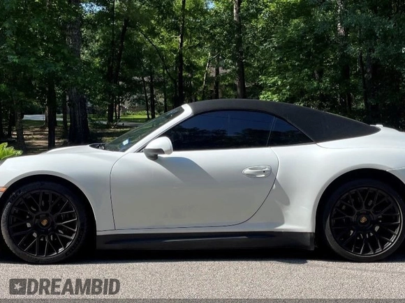 2014 Porsche 911 Carrera z VIN WP0CA2A92ES140453, wystawiony jako IAAI lot #42302853 z przebiegiem 47 879 mil mil oraz . Historia ofert i sprzedaży dostępna na DreamBid. Obrazek 13.