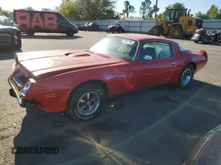 1975 Pontiac Firebird z VIN 2U87S5N582923, wystawiony jako Copart lot #72821784 z przebiegiem 37 718 mil mil oraz Tytuł czysty. Historia ofert i sprzedaży dostępna na DreamBid. Obrazek 1.