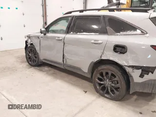 2023 Kia Sorento SX z VIN 5XYRKDLF0PG189570, wystawiony jako IAAI lot #41587404 z przebiegiem 22 006 mil mil oraz . Historia ofert i sprzedaży dostępna na DreamBid. Obrazek 12.