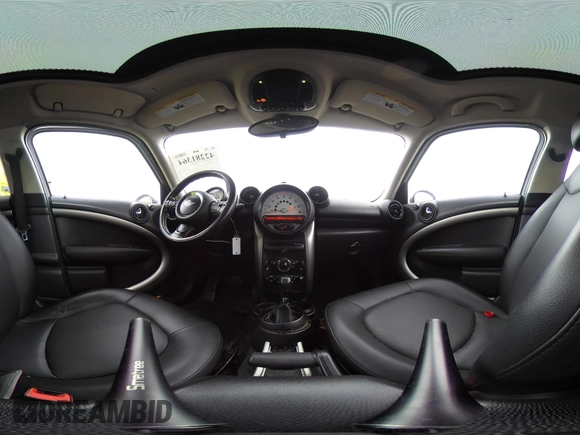 2013 MINI Countryman with VIN WMWZB3C53DWM08244, listed as a IAAI auction lot 42281364 with 139,894 mi miles and . Bid and sale history available at DreamBid. Image 21.