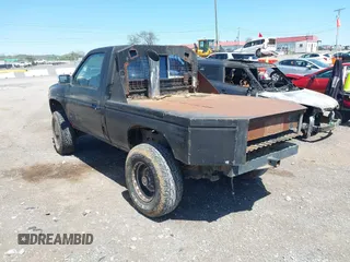 1996 Nissan Frontier XE z VIN 1N6SD11Y6TC377066, wystawiony jako IAAI lot #42041547 z przebiegiem 188 379 mil mil oraz . Historia ofert i sprzedaży dostępna na DreamBid. Obrazek 3.