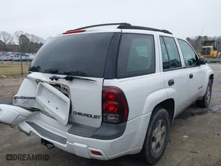 2004 Chevrolet TrailBlazer LT with VIN 1GNDS13S242323532, listed as a IAAI auction lot 41704397 with 262,923 mi miles. Bid and sale history available at carsss.com. Image 4.