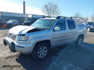 2006 Honda Ridgeline RTL with VIN 2HJYK165X6H570027, listed as a IAAI auction lot 41868389 with 207,020 mi miles. Bid and sale history available at carsss.com. Image 2.