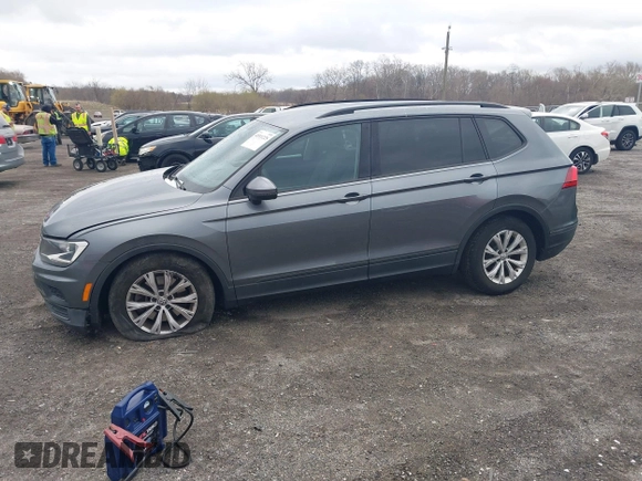 2019 Volkswagen Tiguan S with VIN 3VV0B7AX1KM046808, listed as a IAAI auction lot 41911225 with 62,972 mi miles and . Bid and sale history available at DreamBid. Image 14.