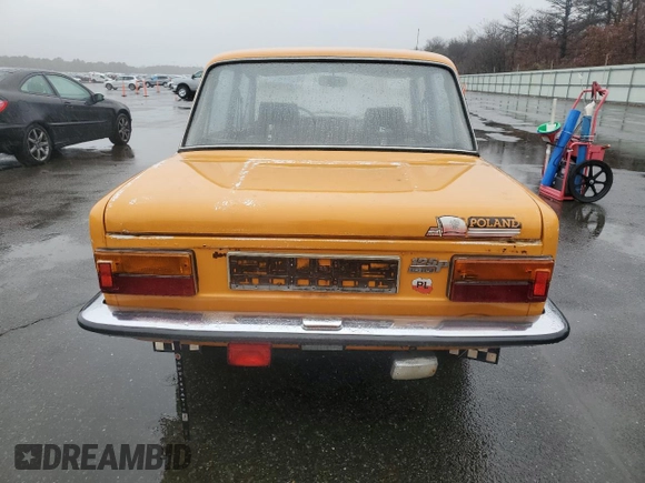 1984 FIAT 124 Spider z VIN SUP115CC602154116, wystawiony jako Copart lot #82469494 z przebiegiem 3 613 mil mil oraz Szkoda całkowita • Salvage title. Historia ofert i sprzedaży dostępna na DreamBid. Obrazek 6.