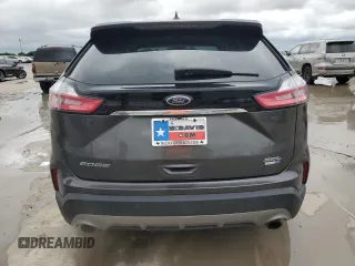 2019 Ford Edge SEL z VIN 2FMPK4J92KBB21770, wystawiony jako Copart lot #56056585 z przebiegiem 64 042 mil mil oraz Szkoda całkowita • Salvage title. Historia ofert i sprzedaży dostępna na DreamBid. Obrazek 6.