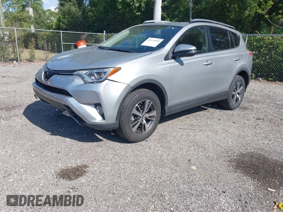 2018 Toyota RAV4 XLE with VIN JTMWFREV9JJ203353, listed as a IAAI auction lot 42129995 with 41,806 mi miles and . Bid and sale history available at DreamBid. Image 18.