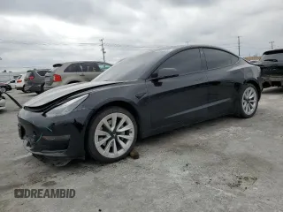 2022 Tesla Model 3 with VIN 5YJ3E1EA3NF190102, listed as a Copart auction lot 50657535 with 73,015 mi miles and Salvage Title. Bid and sale history available at DreamBid. Image 1.