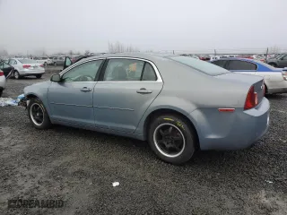 2009 Chevrolet Malibu LS w/1FL with VIN 1G1ZG57N894191036, listed as a Copart auction lot 87018924 with 156,860 mi miles and Salvage Title. Bid and sale history available at carsss.com. Image 2.