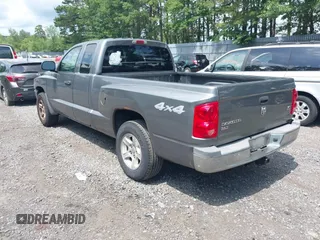 2005 Dodge Dakota SLT with VIN 1D7HW42N25S155393, listed as a IAAI auction lot 42727690 with 230,042 mi miles and . Bid and sale history available at DreamBid. Image 3.