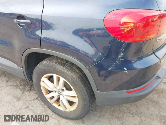 2015 Volkswagen Tiguan S z VIN WVGBV7AX8FW503114, wystawiony jako IAAI lot #42397033 z przebiegiem 200 658 mil mil oraz . Historia ofert i sprzedaży dostępna na DreamBid. Obrazek 19.