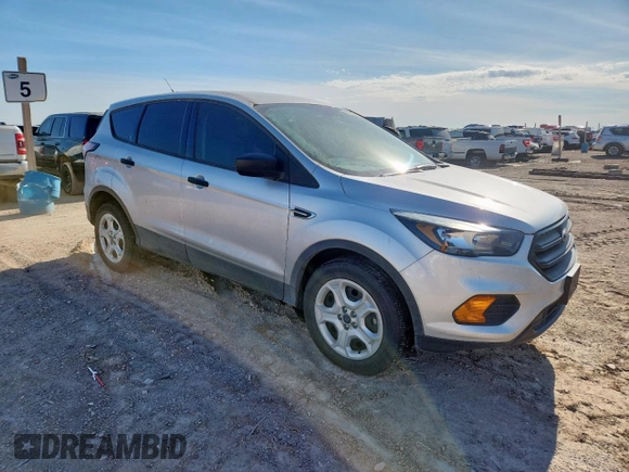 2018 Ford Escape S with VIN 1FMCU0F73JUD50086, listed as a Copart auction lot 60850495 with 67,629 mi miles and Salvage title. Bid and sale history available at DreamBid. Image 4.
