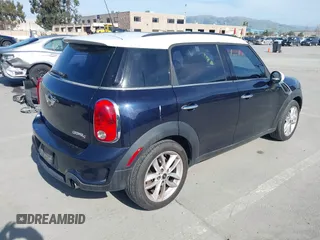2011 MINI Countryman S z VIN WMWZC3C53BWL78687, wystawiony jako IAAI lot #41871368 z przebiegiem 125 397 mil mil oraz . Historia ofert i sprzedaży dostępna na DreamBid. Obrazek 4.