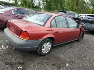 1997 Saturn SL z VIN 1G8ZH5285VZ188074, wystawiony jako Copart lot #51501005 z przebiegiem 125 973 mil mil oraz Nie do naprawy • Non repairable. Historia ofert i sprzedaży dostępna na DreamBid. Obrazek 3.