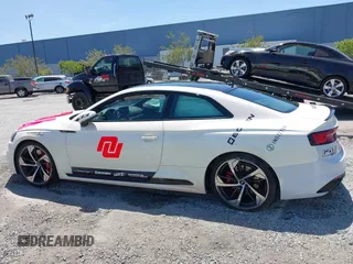 2018 Audi RS 5 z VIN WUAPWAF55JA903152, wystawiony jako IAAI lot #42193996 z przebiegiem 95 730 mil mil oraz . Historia ofert i sprzedaży dostępna na DreamBid. Obrazek 14.