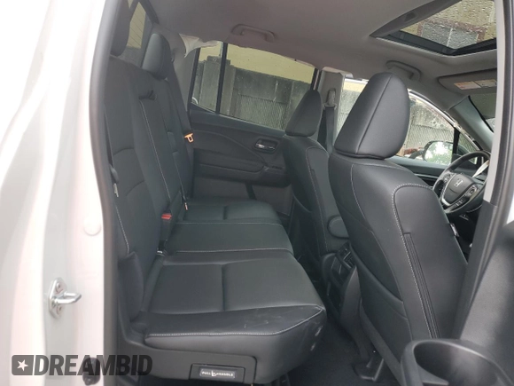 2023 Honda Ridgeline RTL-E with VIN 5FPYK3F76PB064582, listed as a Copart auction lot 63629375 with 11,940 mi miles and Salvage title. Bid and sale history available at DreamBid. Image 10.