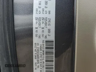 2019 Dodge Grand Caravan SXT with VIN 2C4RDGCGXKR518476, listed as a Copart auction lot 52341455 with 59,102 mi miles and Salvage Title. Bid and sale history available at DreamBid. Image 14.