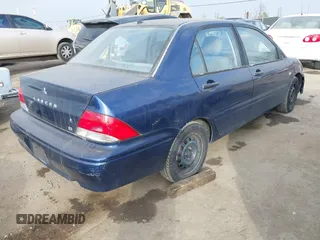 2003 Mitsubishi Lancer ES with VIN JA3AJ26E13U010757, listed as a IAAI auction lot 41450627 with 232,122 mi miles. Bid and sale history available at carsss.com. Image 4.