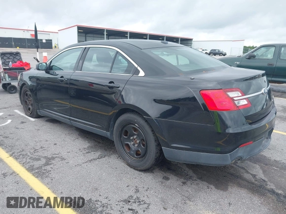 2014 Ford Police Interceptor with VIN 1FAHP2MKXEG105669, listed as a IAAI auction lot 42240752 with 133,148 mi miles and . Bid and sale history available at DreamBid. Image 3.