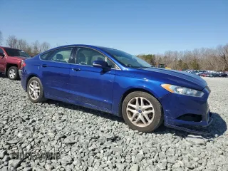 2016 Ford Fusion SE with VIN 3FA6P0H7XGR237571, listed as a Copart auction lot 48798975 with 128,410 mi miles and Salvage Title. Bid and sale history available at DreamBid. Image 4.