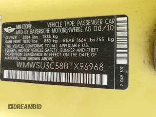 2011 MINI Hardtop with VIN WMWSU3C58BTX96968, listed as a Copart auction lot 62560915 with 88,616 mi miles and Salvage title. Bid and sale history available at DreamBid. Image 12.