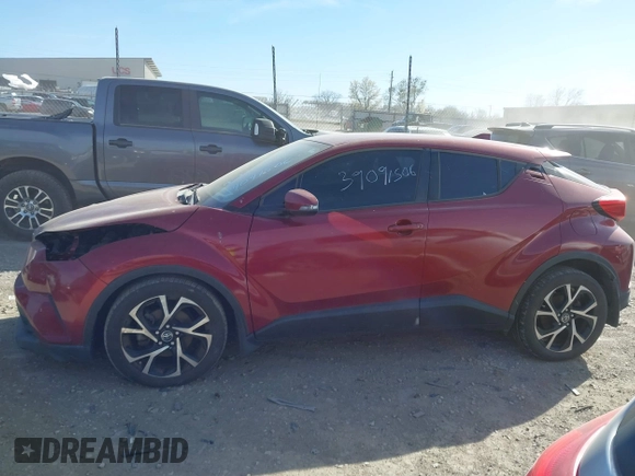 2018 Toyota C-HR XLE with VIN NMTKHMBX3JR059057, listed as a IAAI auction lot 41810801 with 124,246 mi miles. Bid and sale history available at carsss.com. Image 14.