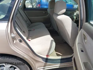 2001 Toyota Avalon XL w/Bucket Seats with VIN 4T1BF28B61U185881, listed as a IAAI auction lot 42138345 with 242,195 mi miles. Bid and sale history available at carsss.com. Image 8.